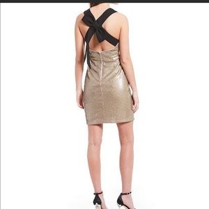 Badgley Mischka sparkly mini dress with black bow detail